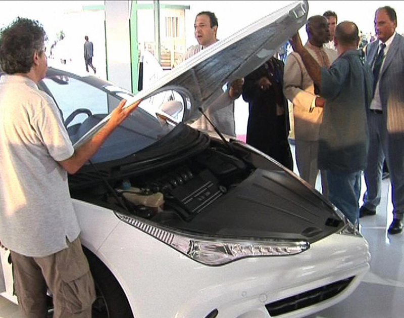 Illustration for article titled Moammar Gadhafi's Custom-Built Not-So-Rocket Car